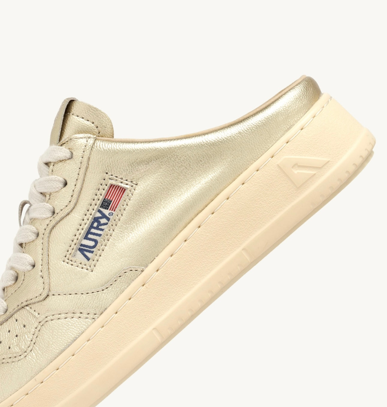 MEDALIST MULE SNEAKERS IN GOLD NAPA LEATHER