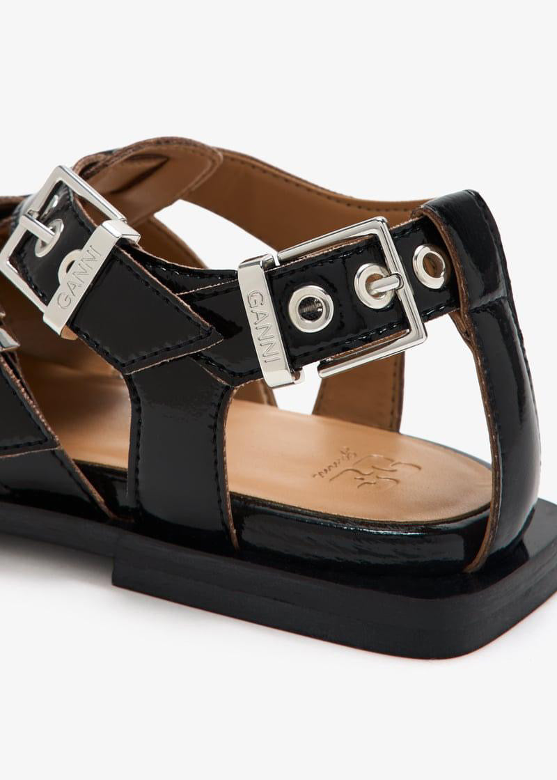 Feminine Buckle Sandal in Black
Ganni