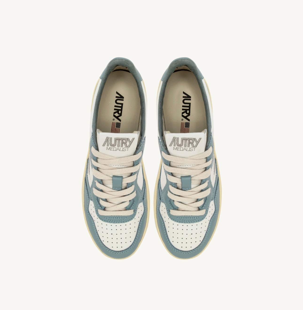 AUTRY SNEAKERS WOMAN
MEDALIST PLATFORM SNEAKERS IN WHITE AND SILVER BLUE LEATHER